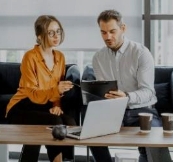 Couple looking at laptop